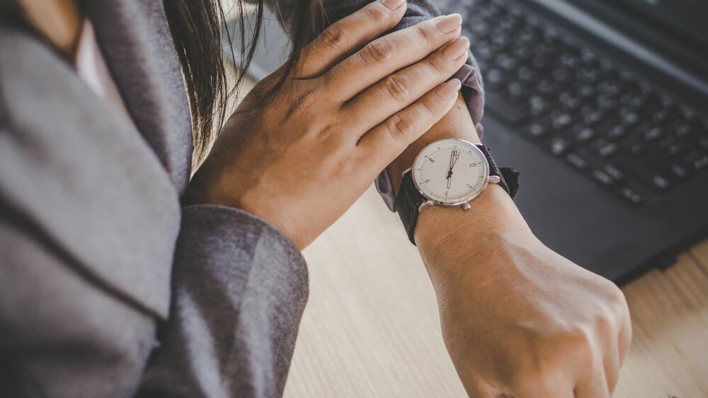 Woman checking her watch